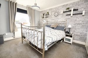 Bedroom One- click for photo gallery